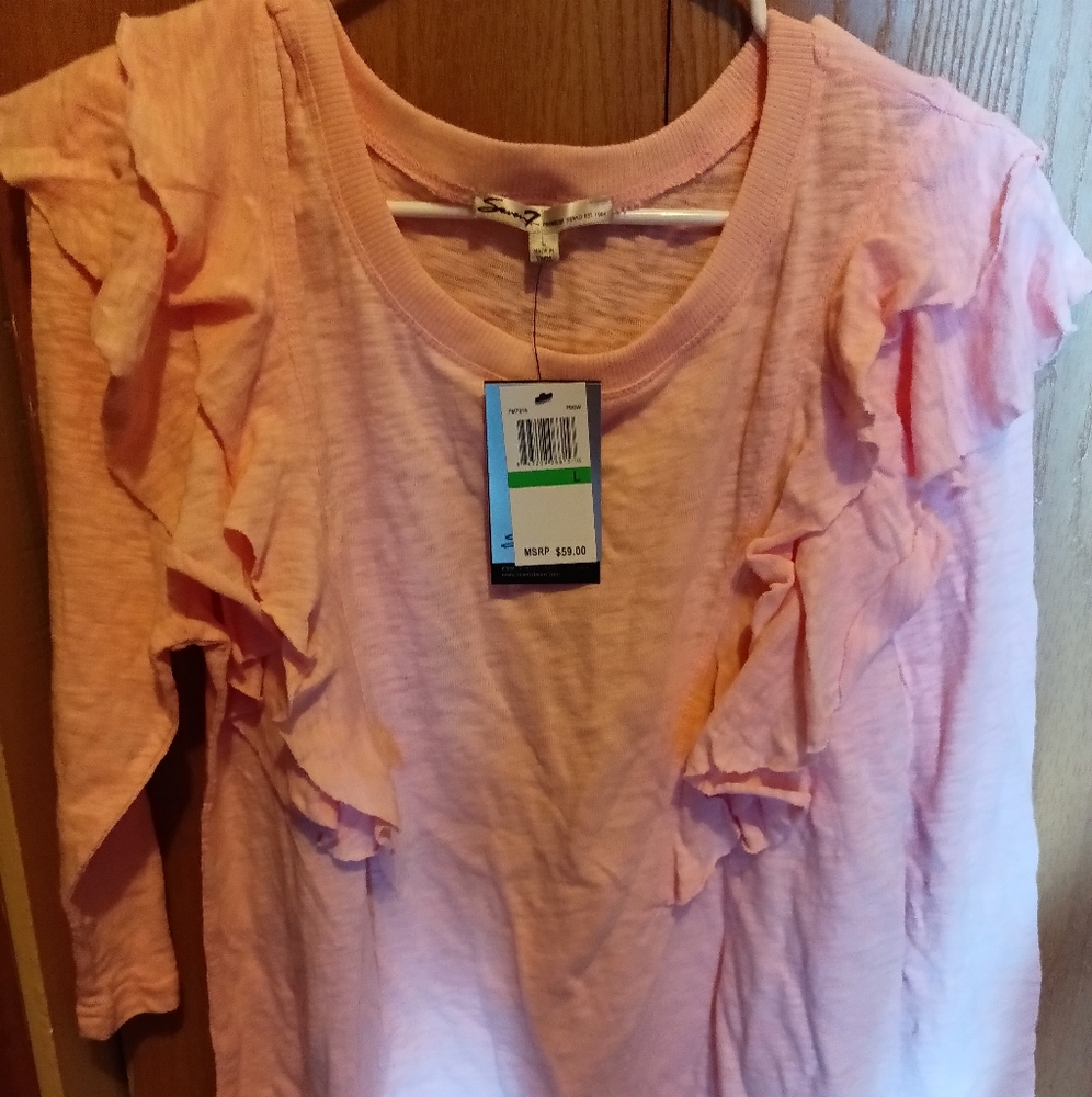 Peach color shirt from seven. Size large.